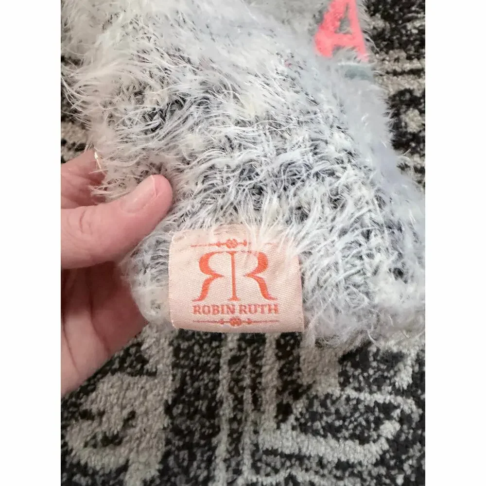 Robin Ruth Alaska heavy weight knit beanie hat with a variegated pink pom pom